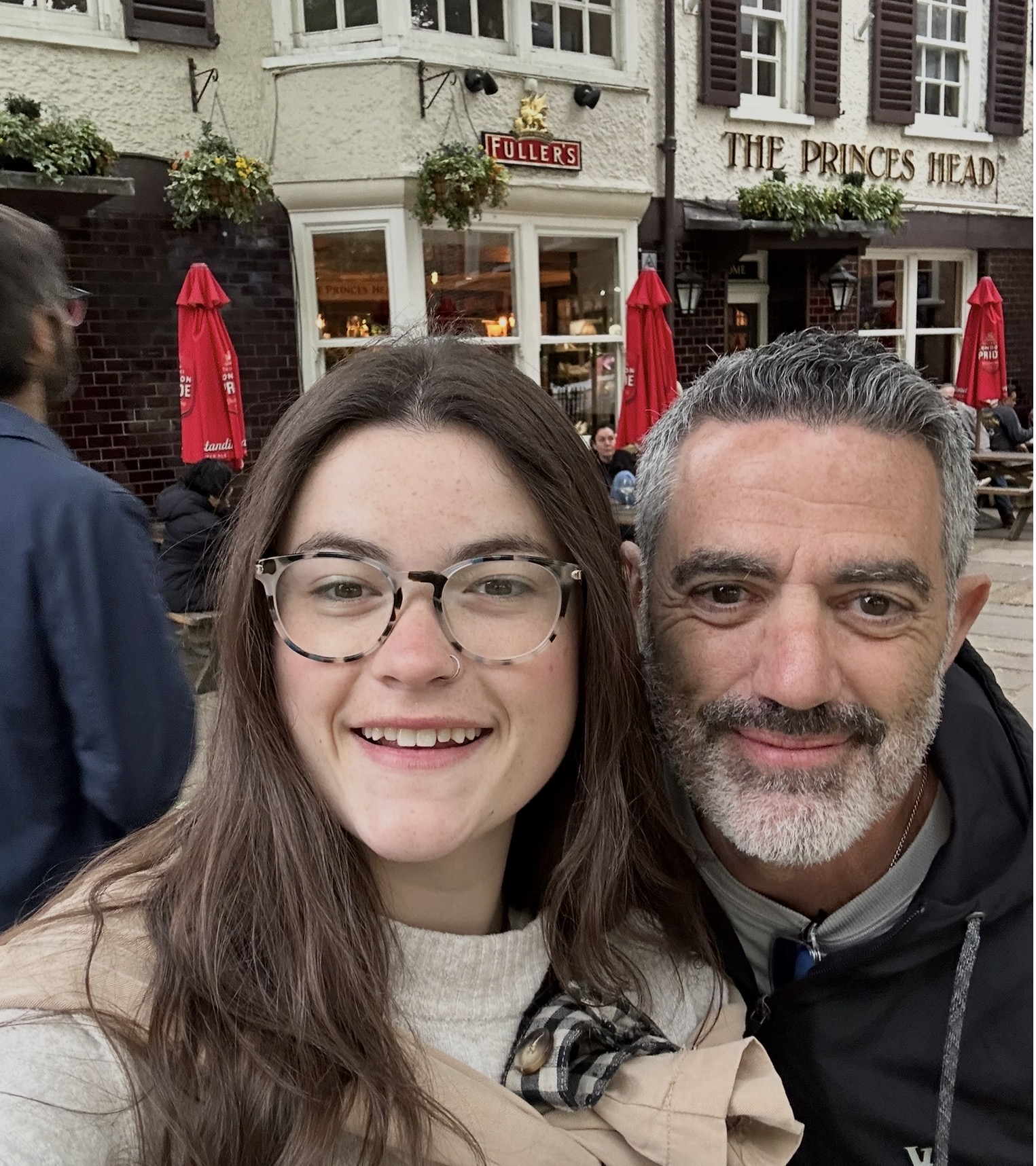 Father and daughter together while traveling in England